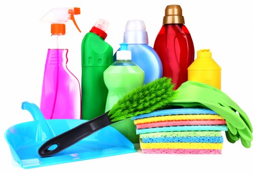 Professional cleaner in Stockwell preparing a spotless living room